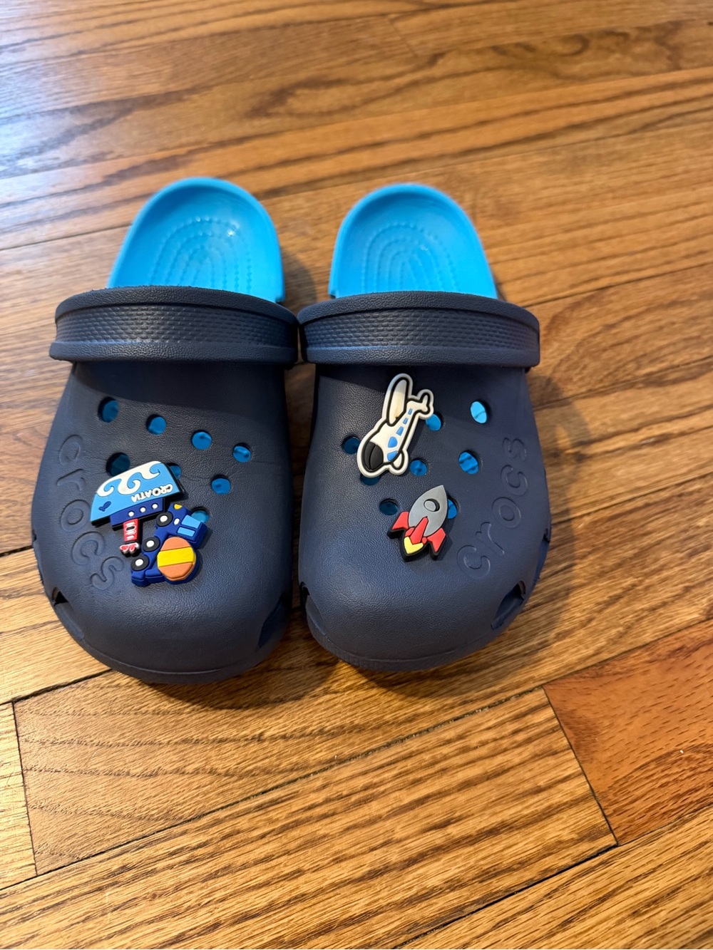 CROCS Kids Navy Clog Slides with Bright Blue Insole and Space Charms